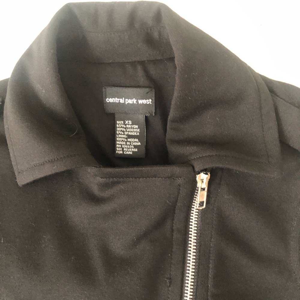 Black waist length jacket.